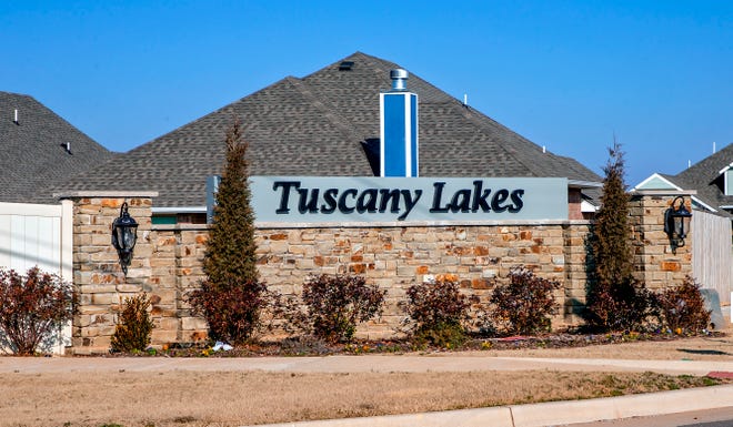 The entrance to Tuscany Lakes addition near NW 122 and N County Line Road.