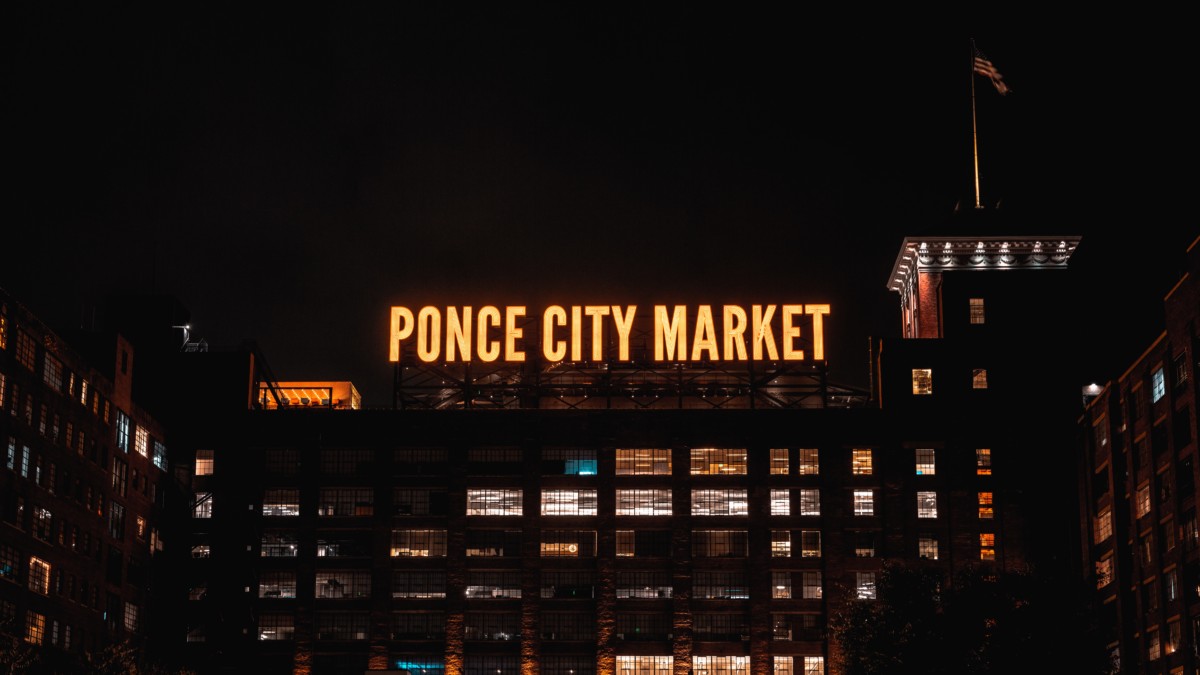ponce city market sign at night time in atlanta
