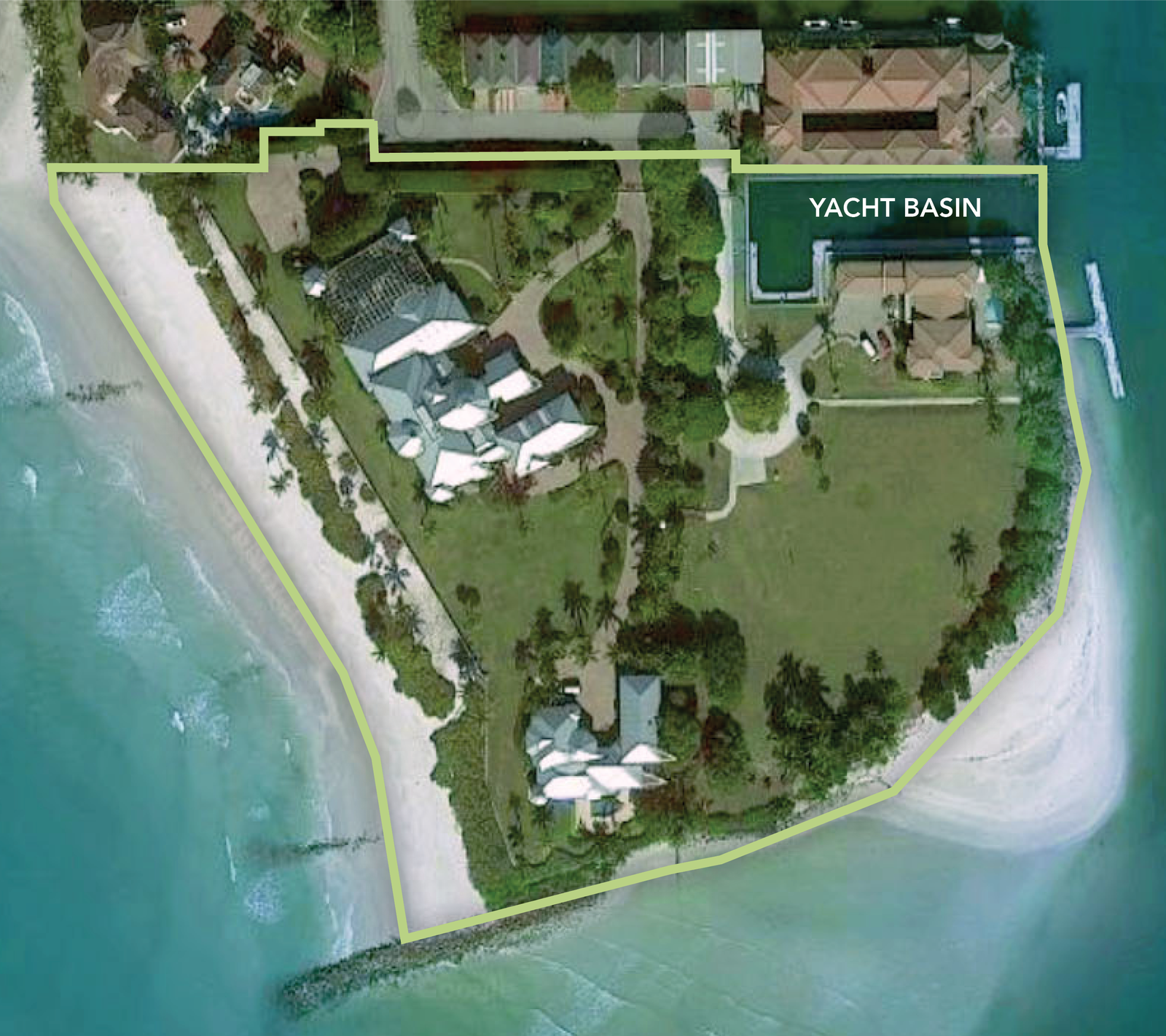 aerial shot of a peninsula with three homes on it and a drawn outline to show where the property begins and ends