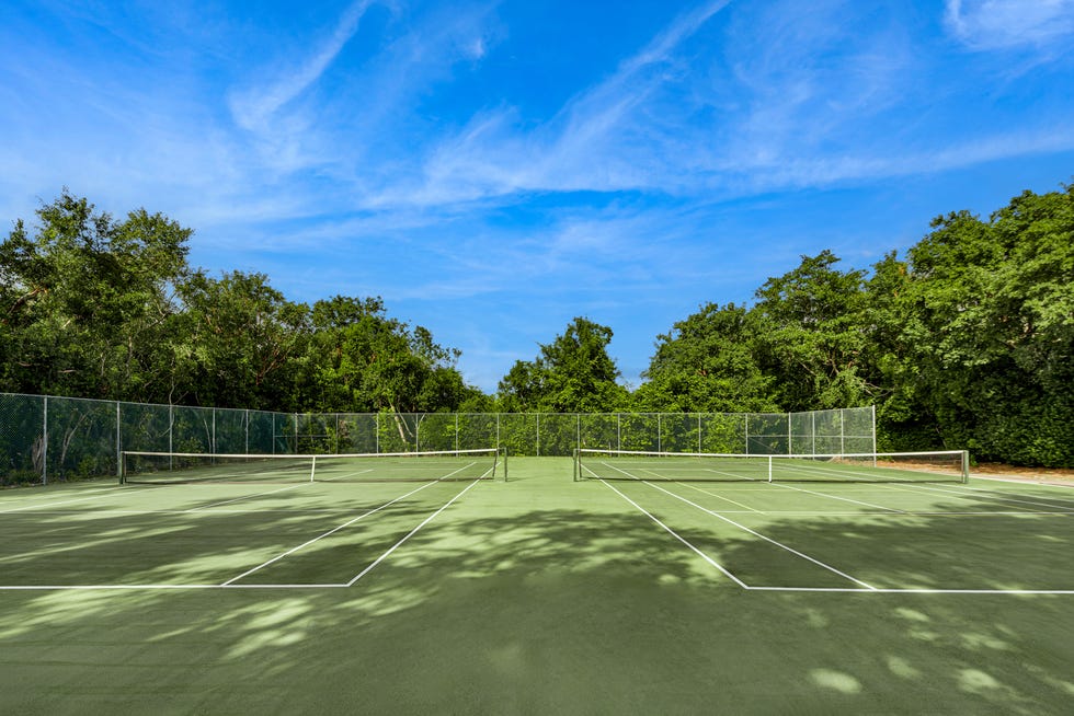 Tennis courts that double as a helicopter pad on Pumpkin Key. The entire private island along with a mainland house in the Key Largo Ocean Reef Club was listed at $75 million on Feb. 13, 2024 by Compass.