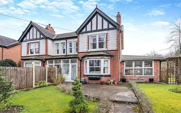 A £475,000 three-bedroom semi-detached period cottage with large gardens is on the market