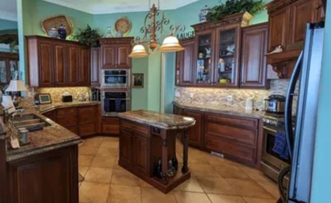 This is the kitchen inside the home at 700 N. Peninsula Drive, New Smyrna Beach.