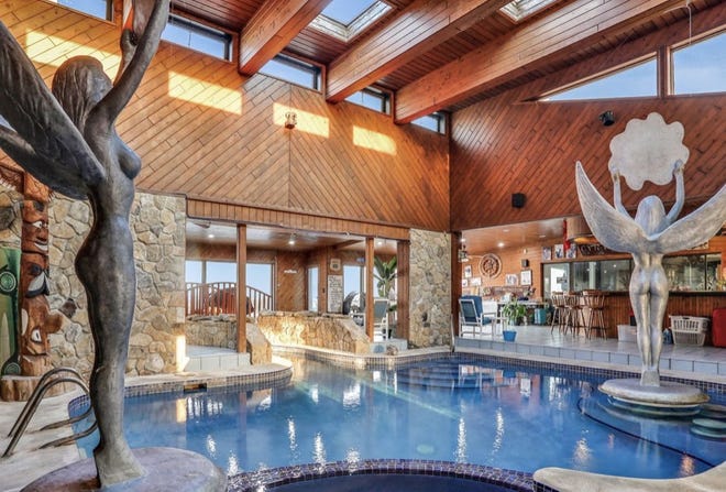 This is an indoor pool at the oceanfront mansion at 175 Ocean Shore Blvd. in Ormond Beach. The 12,414-square-foot four-bedroom, five-bath custom home belonged to the late Hawaiian Tropic founder Ron Rice. It was put up for sale on Thursday, Nov. 24, 2022 with an asking price of just under $6 million. It sits on a full acre that includes 200 feet of beach frontage.