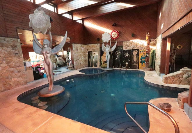 This is the indoor pool inside the oceanfront mansion of the late Ron Rice, seen here on Monday, Nov. 28, 2022. The pool connects to one of the property's two outdoor pools and is adorned by statues that are giant-sized replicas of the trophies Rice used to give out to winners of his suntan lotion company's Miss Hawaiian Tropic International pageants. The luxury home at 175 Ocean Shore Blvd. in Ormond Beach was put up for sale by Rice's estate on Thanksgiving Day 2022.