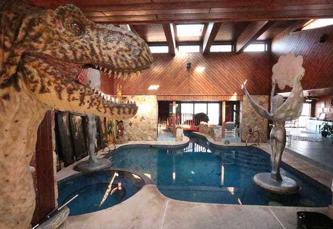 The indoor pool connects to the large outdoor pool in the oceanfront mansion of the late Ron Rice, seen here on Monday, Nov. 28, 2022. The luxury home at 175 Ocean Shore Blvd. in Ormond Beach was put up for sale by Rice's estate on Thanksgiving Day 2022.