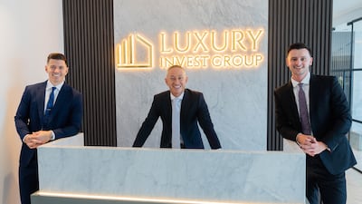 Jamie Grimshaw, centre, co-founder of Luxury Invest Group, bought his first home in Dubai two years ago. Photo: Luxury Invest Group