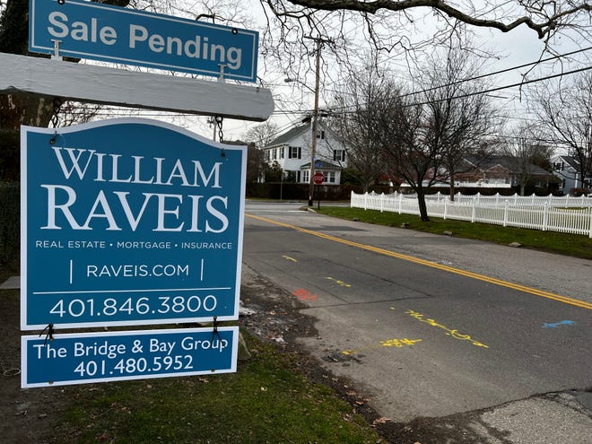 A real estate sign notifies a pending sale on Kay Street in Newport.