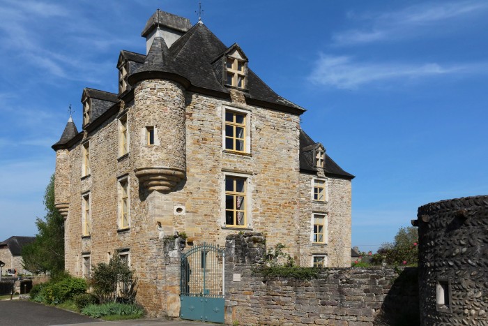 A tall château with watchtowers