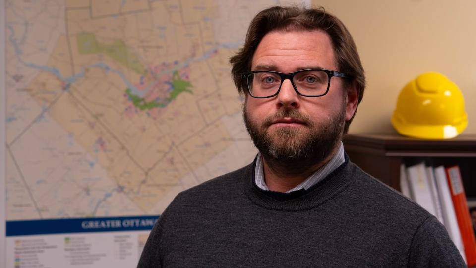 Jason Burggraaf, the executive director of the Greater Ottawa Homebuilders' Association, is in favour of the federal government's strategy to lease unused land for new housing starts — but worries there could be delays. (Jean Delisle/CBC - image credit)