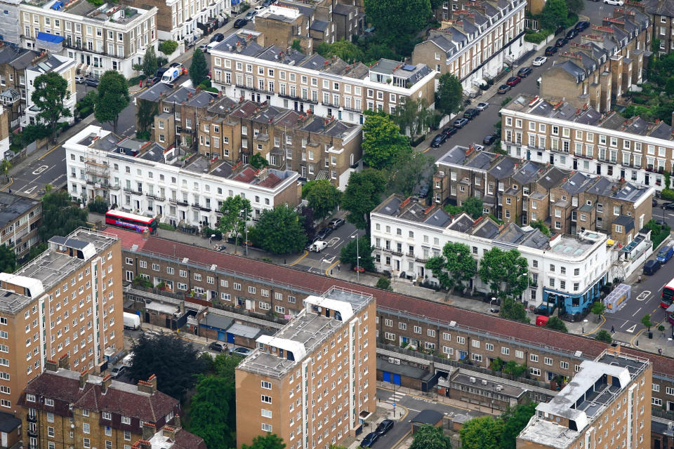 house prices: File photo dated 09/07/21 of an aerial view of terraced housing and blocks of flats in west London. Chancellor of the Exchequer Jeremy Hunt will deliver his Budget at the House of Commons, London, on Wednesday. Issue date: Wednesday March 6, 2024. PA Photo. See PA story POLITICS Budget. Photo credit should read: Victoria Jones/PA Wire 