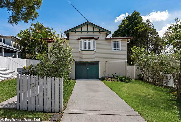 Brisbane's median house price during the past year has soared by 15.9 per cent to $920,046, putting it within striking distance of overtaking Melbourne (pictured is a house in Moorooka)