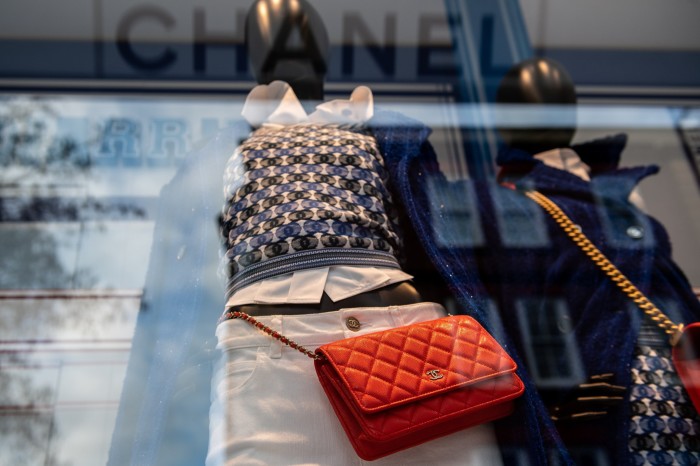 Chanel products are seen in the window of the store in South Kensington
